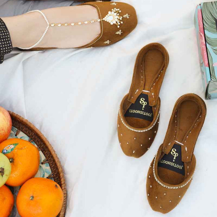 Close-up of Mitti Kids Khussa shoes highlighting texture and embroidery details