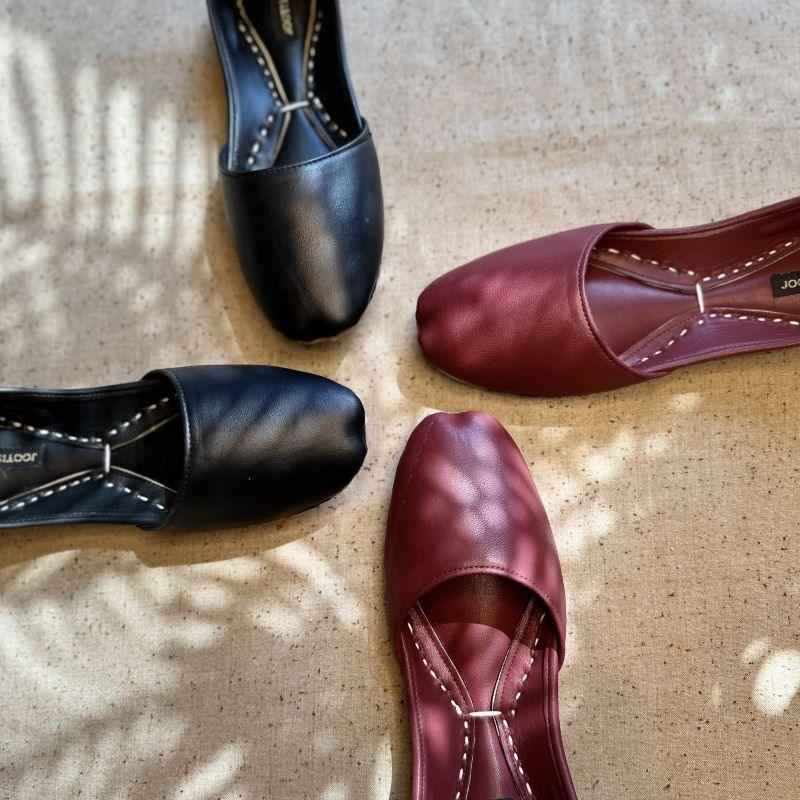 “Side view of Black Nawabi Khussa shoes showing smooth black leather and comfortable fit for women”